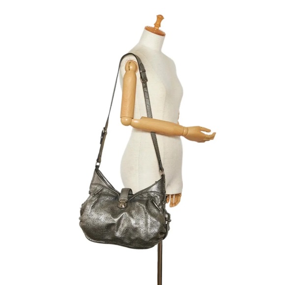 Louis Vuitton MAHINA LEATHER BAG - Picture 8 of 10